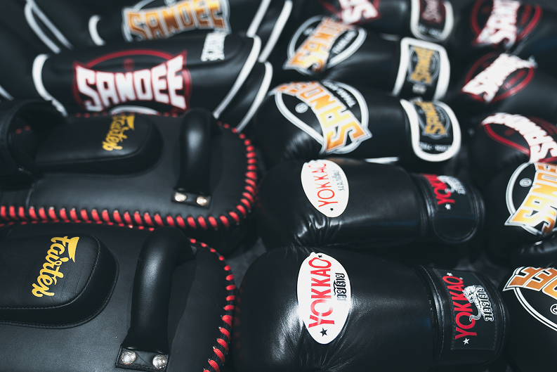 A collection of Muay Thai Kick pads, Thai gloves and shin pads for training in the Saint Muay Thai Gym