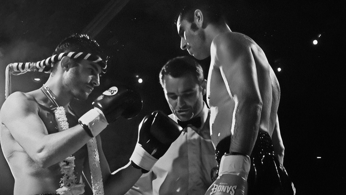 Trevor Saint focused and engaged in a Muay Thai fight in the ring